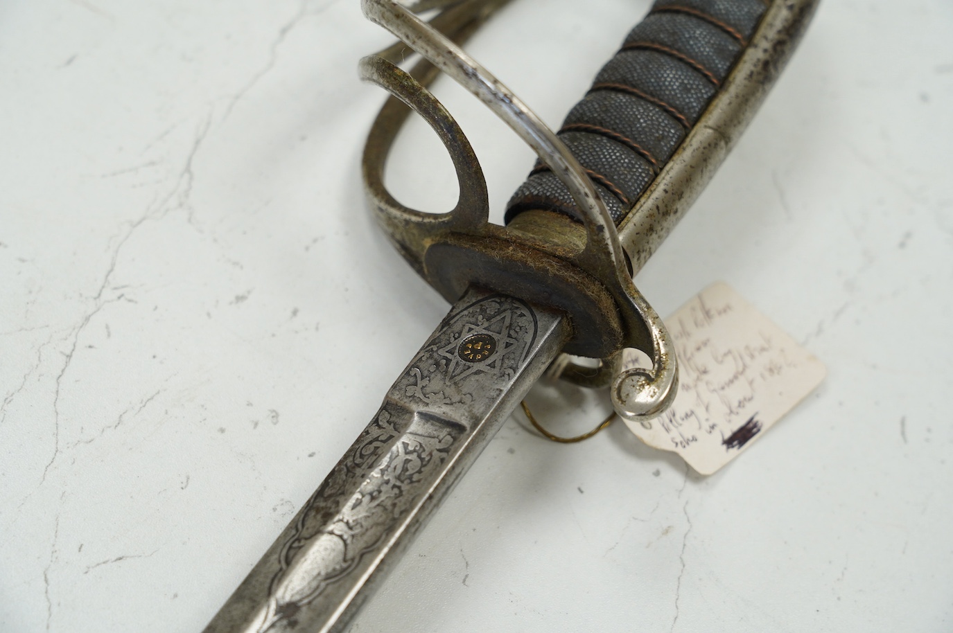 A Victorian Royal Artillery officer’s sword, regulation etched blade, regulation plated hilt, blade 88cm. Condition - fair, well worn
